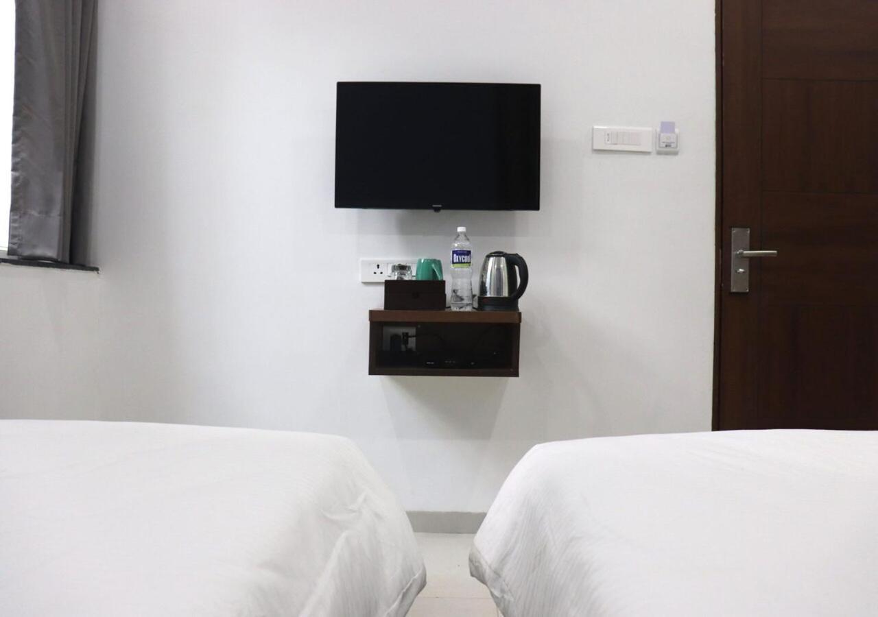Sharman Suites Пюн Екстериор снимка